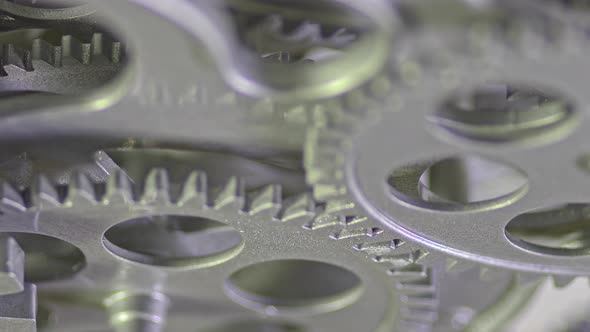 Gray Old Metallic Gears Mechanism Working Zoom Out Close Up alt