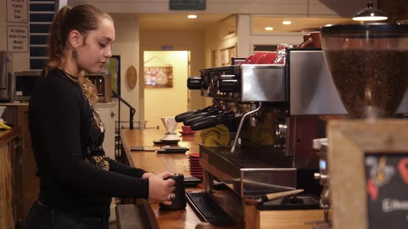 Woman working at a coffee shop