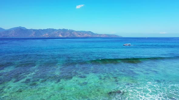 Aerial travel of paradise island beach break by blue ocean and bright sand background of a daytrip n alt
