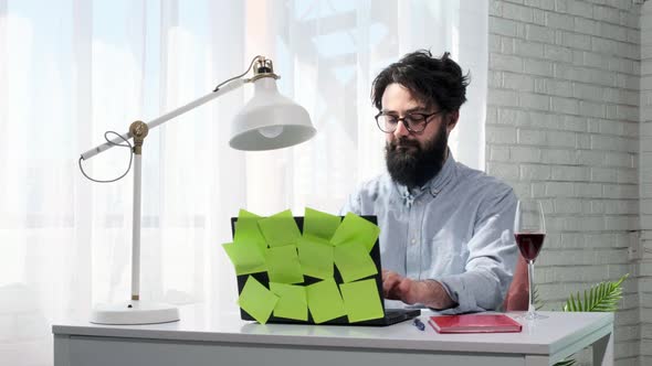 Man Types and Then Presses the Enter Button and Looks Happily at the Screen alt