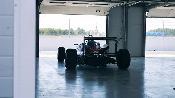 Racing Cart in the Workshop with Nobody Inside alt