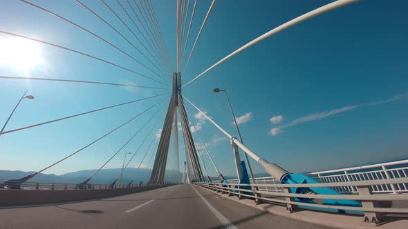Driving on the Rio–Antirrio bridge. Above Golf of Corinth direction Patras Peloponnese Greece. Offic alt