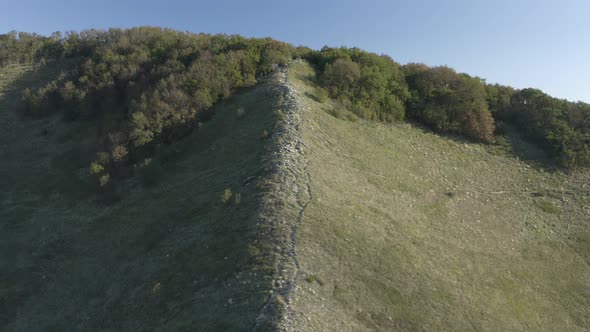 Aerial View Natural Mountain Ridge Path Park Village on Cliff Area Dense Green Trees Forest Woodland alt