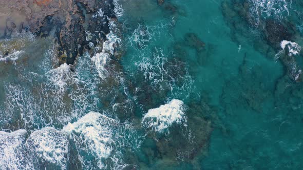 Aerial view of natural background - Foaming and Splashing in the Ocean. Fly above sea water  alt