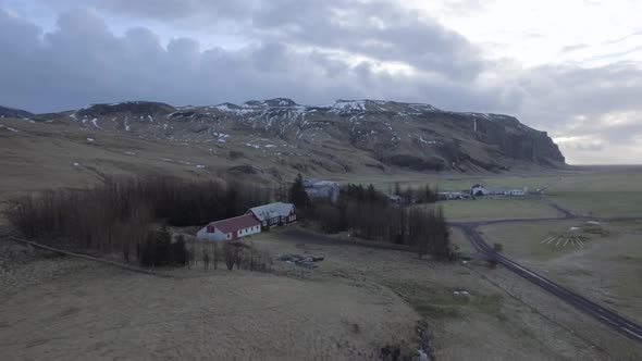 Aerial view of houses and farm in the countryside in Iceland