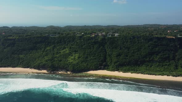 Aerial View on the Green Cliff in Nunggalan Beach alt