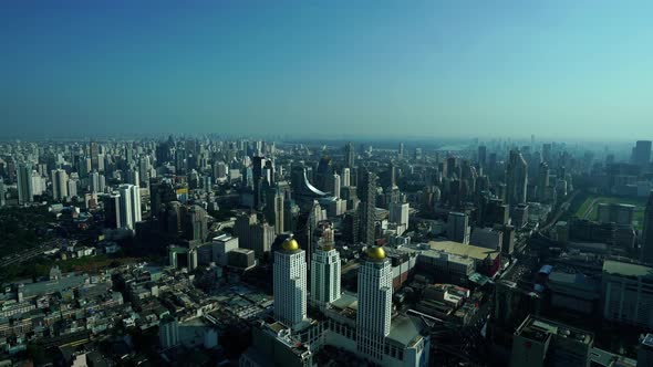 panning shot of Bangkok city downtown skyline, view from Baiyoke Tower II in Bangkok, Thailand alt