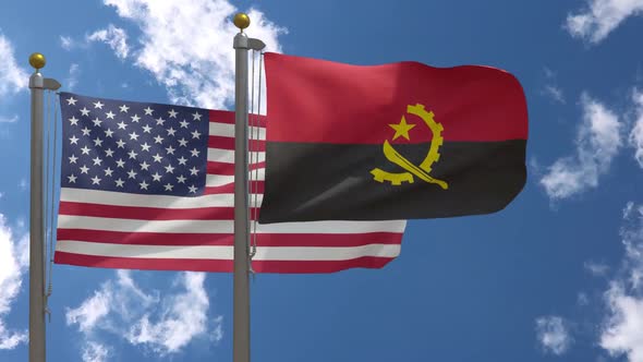 Usa Flag Vs Angola Flag On Flagpole alt
