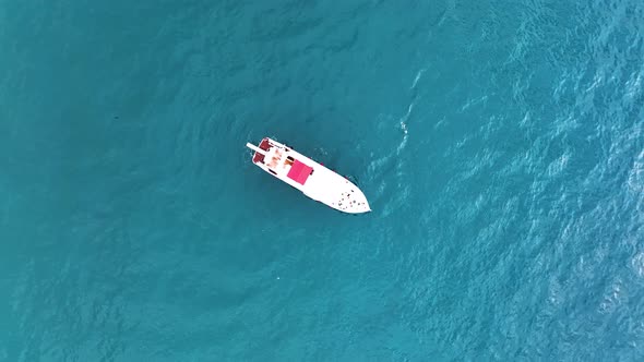 A large yacht stands at sea aerial view 4 K alt