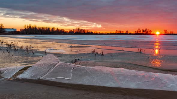 Timelapse of Northern Landscape Frozen Lake at Sunset
