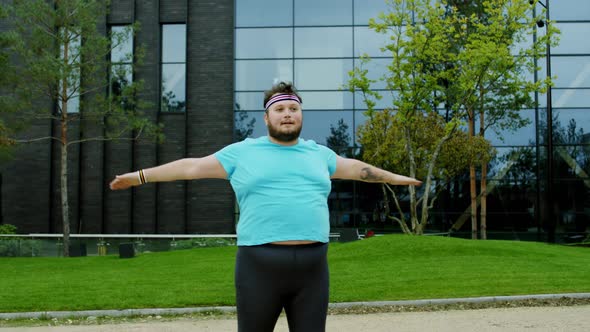 Aerobic Time in Front of the Camera Obese Man alt
