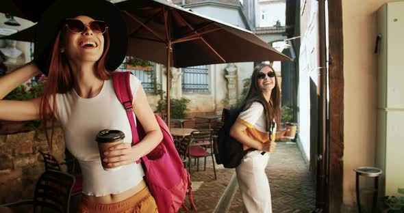 Tourists Woman Walking on Tight Street