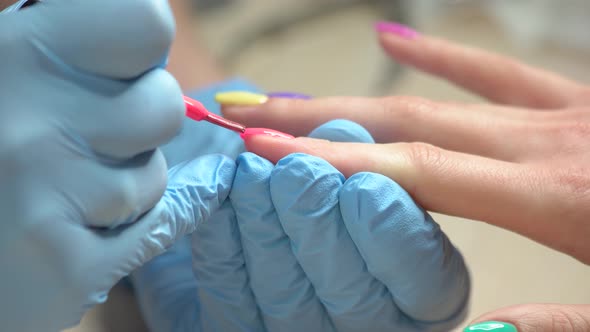 The Process of Nail Applying Close Up alt