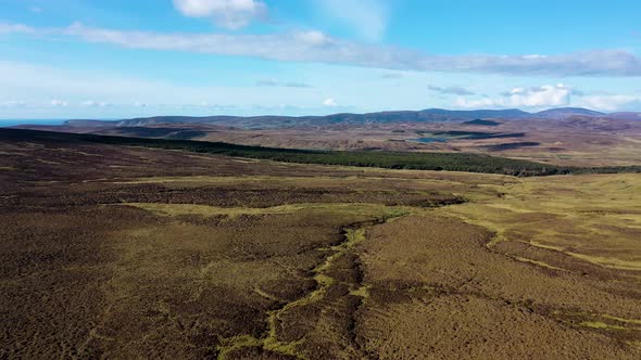 Aerial View of the Beautiful Coast at Malin Beg with Slieve League in the Background in County alt