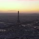 Aerial Descending Footage of Dominant Tourist Landmark in Large City at Dusk - VideoHive Item for Sale