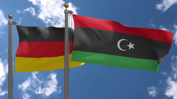 Germany Flag Vs Libya On Flagpole alt