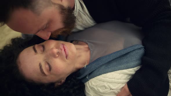 Sleepy Couple Kissing Cheek on Sandy Beach Sea alt