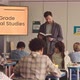 Male Teacher Reading to School Children in Class - VideoHive Item for Sale