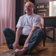 Senior hispanic man doing yoga and fitness for leg stretching at home - PhotoDune Item for Sale