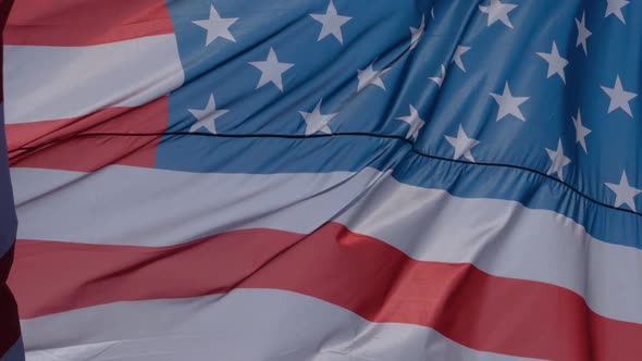 The national USA flag waving in the wind. alt