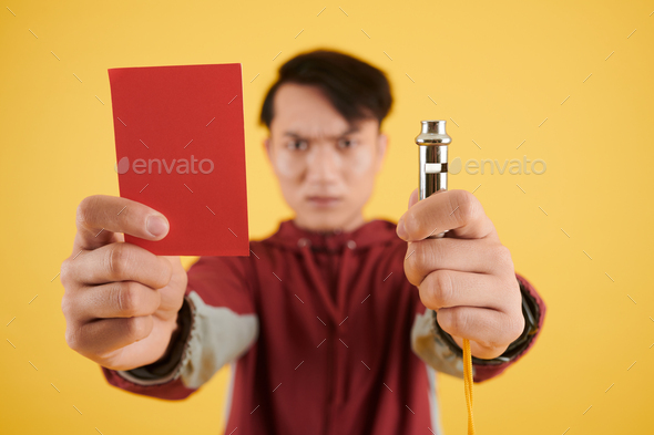 Referee hand(red card) Stock Photo