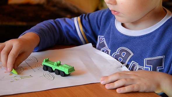 Child Playing With Toys 1