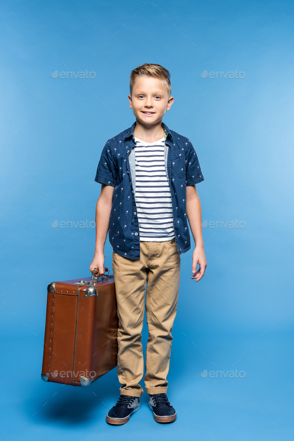 Kid Holding Briefcase Photos, Images and Pictures