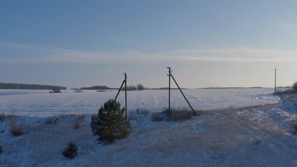 the Electrical Network Is Laid Along the Winter Field