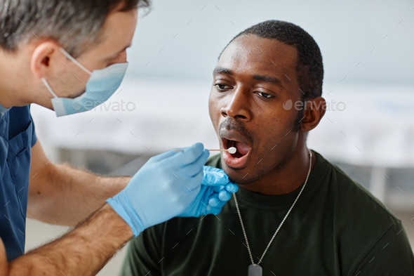 Taking Mouth Swab From Soldier