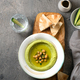A plate of green hummus with chickpeas and pita bread - PhotoDune Item for Sale