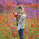 Girl in a spring field with poppies - PhotoDune Item for Sale