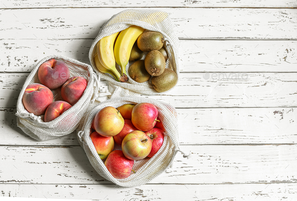 Organic fruits in reusable eco friendly natural bag Stock Photo by ...