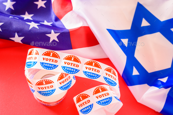I voted today on a sticker label next to a flag of the United States and Israel, allied countries.