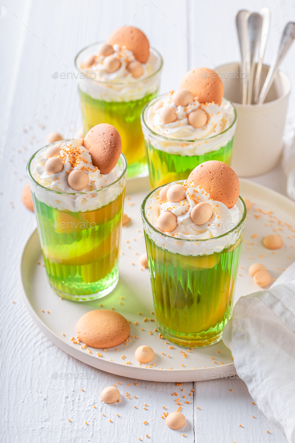 Delicious green jelly made of peaches and whipped cream.