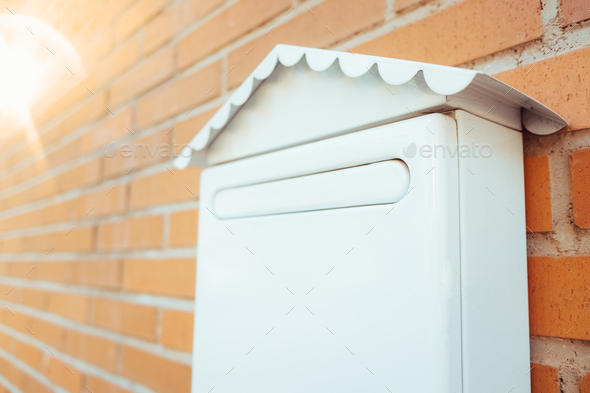 Traditional paper mailings dwindle over time, and mailboxes tend to disappear. Copy space.