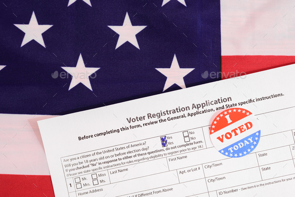 American citizens fill out the form to apply in the voting, on patriotic background of American