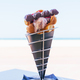 Bubble Waffle with ice cream, strawberries and chocolate placed on a table - PhotoDune Item for Sale