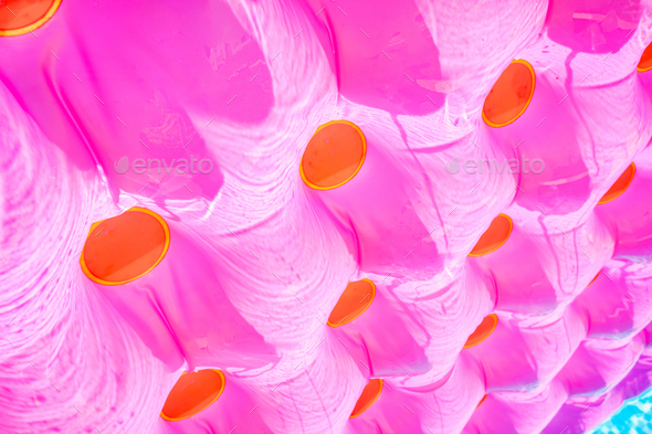Background of a colorful pattern of a floating summer inflatable bed.
