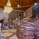 Large stacks of oriental  rugs in a store. Colorful carpet market. Turkey - PhotoDune Item for Sale