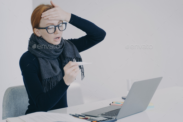 Sick manager at online conference. Unwell girl is shocked with her temperature and fever.