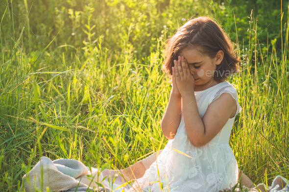 Little girl praying Stock Photo by StiahailoAnastasiia | PhotoDune