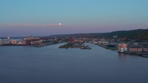 Aerial view large scale grain storage facilities and Taconite piles Duluth Industrial area Rice's po alt