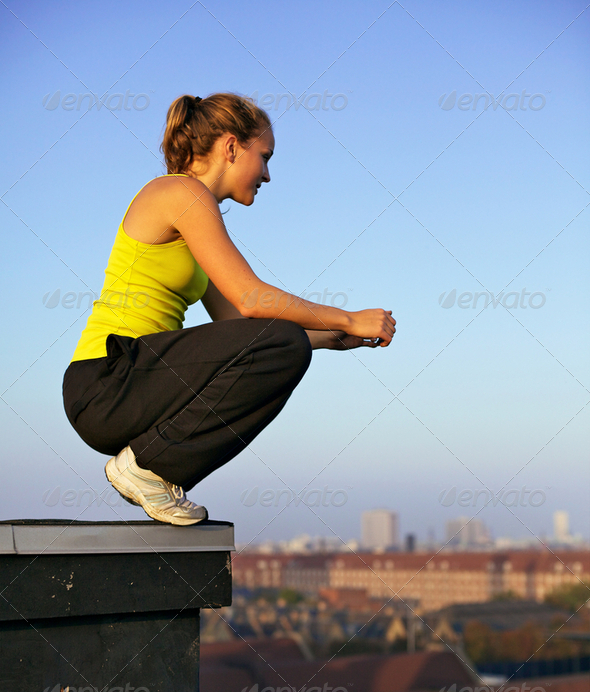 Traceur Balanced On Building Roof - Stock Photo - Images