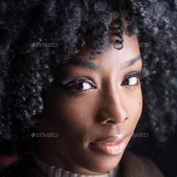 African American woman with black curly hair Stock Photo by MatHayward