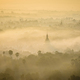 Elevated view of the plain of temples in Mandalay, stupas and spires emerging from the mist - PhotoDune Item for Sale