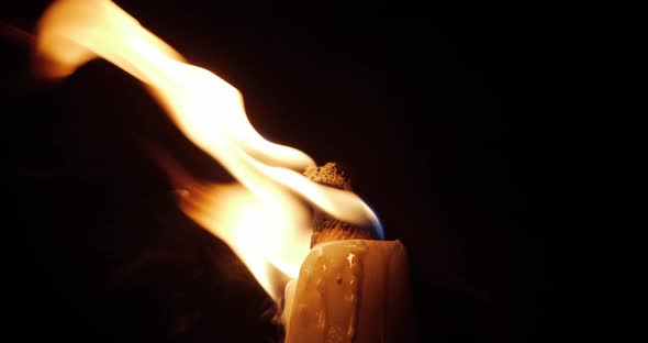 Burning Torch On A Black Background At Night