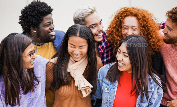 Group of multiracial people laughing together in the city - Concept of ...