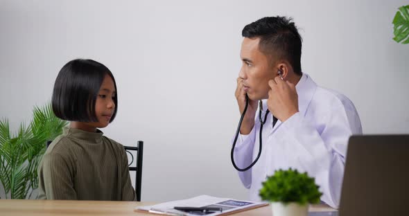 Doctor eyeglasses making conference call and looking at camera alt