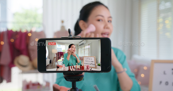 Asia woman micro influencer record live viral video camera at home studio