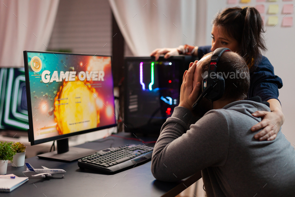 Side view of game over for pro player couple